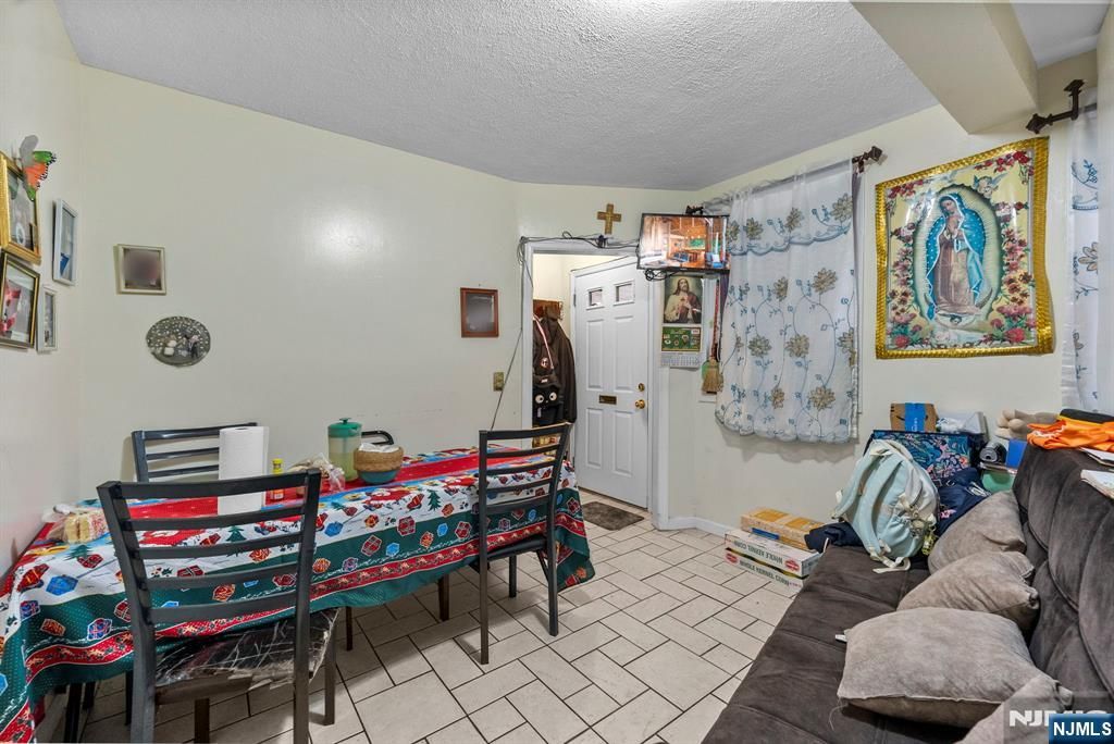 Photo of 117 10th Street, Passaic, NJ 07055 (MLS # 25043882)