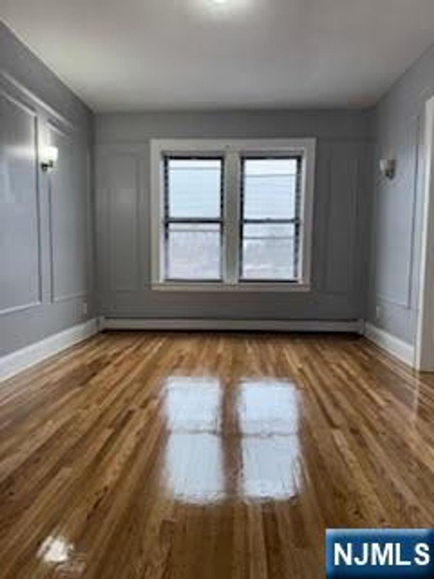 Move-in ready 2-bedroom apartment located on the 2nd floor featuring beautiful hardwood floors and a spacious eat-in kitchen equipped with landlord-supplied gas stove/oven range and refrigerator. One off-street parking space provided. Maximum occupancy limited to four persons. No pets and no smoking permitted.