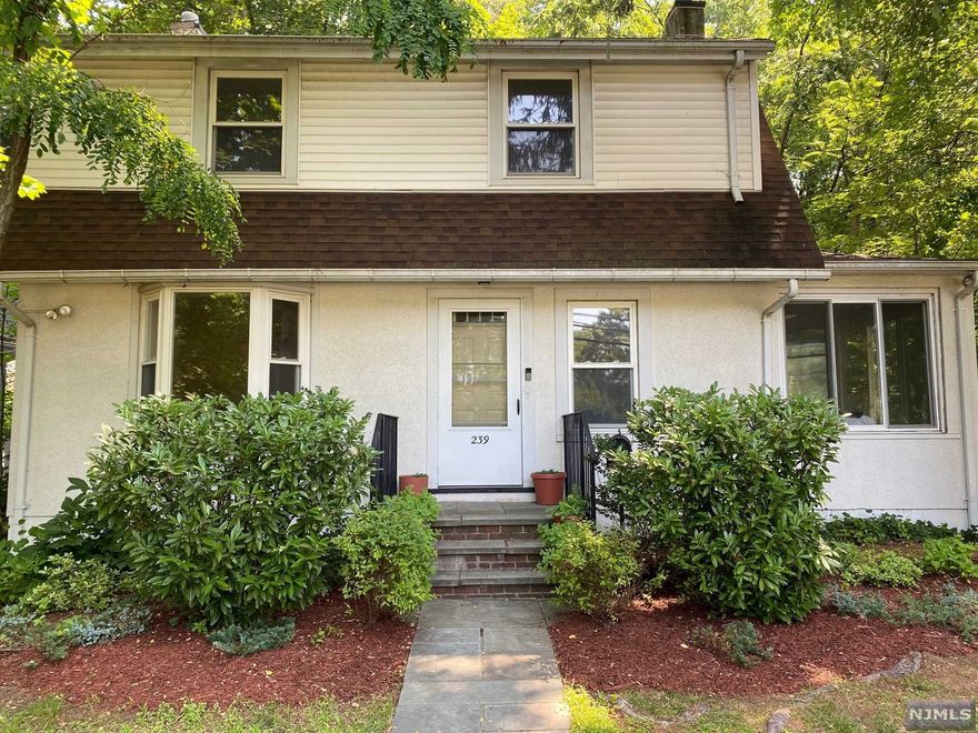 Your search is over !!Ready to build your dream home on this lavish large piece of property, expand or renovate this existing home! This charming colonial offers all these possibilities right in the heart of Mahwah! This home features a Living room with a stone fireplace, dining room with large bay window, updated kitchen with a lot of natural sunlight, powder room and 3 very spacious bedrooms. Hardwood floors through out and a full unfinished basement. Quick access to NYC, walk to the bus stop or train station. Low taxes.very large parklike property.Walking distance to train station