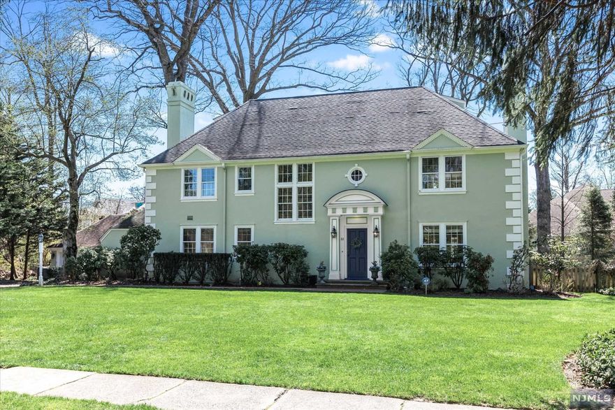 A beautiful south side estate section Colonial truly worthy of your "wish list!" Large scale rooms with room to grow, an expansive level backyard (over 1/2 acre) with, yes, room for a pool, stunning curb appeal, loads of natural sunlight, gorgeous natural hardwood floors and an open kitchen/family room. Inviting front staircase boasts double height windows. The wide 1st floor layout is lighted by a stream of French doors in every room including the living room, dining room, family room and kitchen, all overlooking the patio, screened-in porch and sweeping backyard. Perfectly located in the private enclave (adjacent to a cul-de-sac) of the south side estate section in coveted Montclair. Close to trending top restaurants and shops plus all that is special and unique only to Montclair! Welcome home!