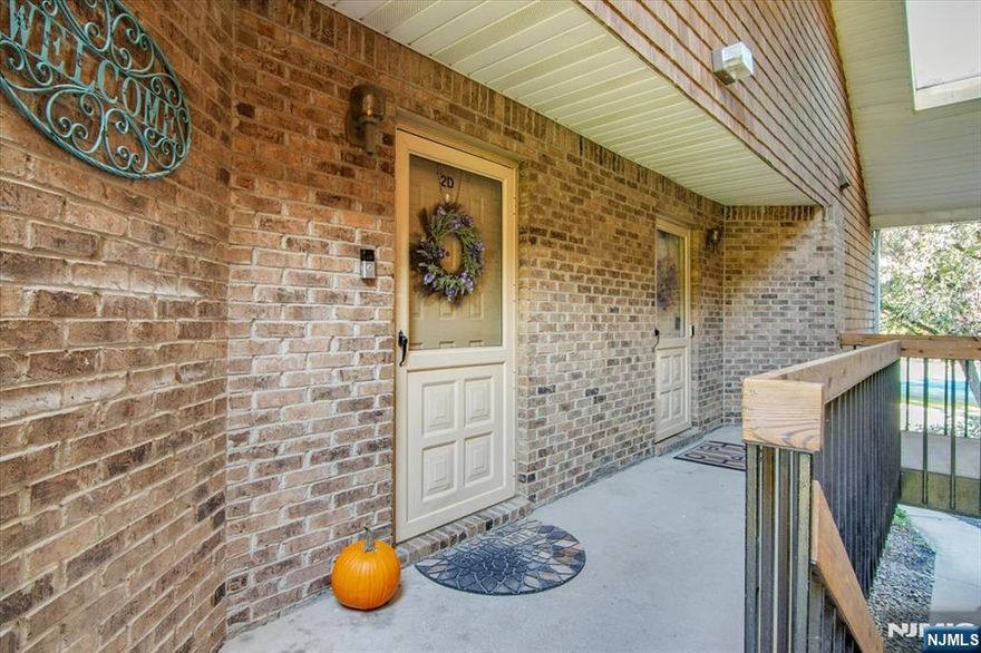 Step inside the most beautiful condo in the world! Completely renovated from floor to ceiling...everything is brand new, from the windows and flooring to the stunning kitchen, bathrooms, and lighting. The open layout features a sun-filled dining area and an expansive living room with high ceilings, a wood-burning fireplace, and sliders to your private deck. The spacious bedrooms offer great closets, including a dreamy primary suite with a walk-in closet and spa-like bath. Move right in and fall in love...this one won't last long! Steps to NYC transportation, restaurants, entertainment, schools and all kinds of shopping. Your new home awaits. Start your next chapter here!