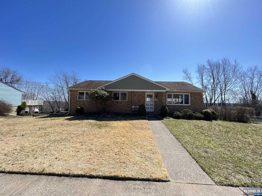 Beautifully maintained 3 Bedroom/2.5 Bathroom Ranch boasting spectacular New York City views. Main level is filled with natural light and features an updated kitchen, living room, dining room, 3 bedrooms & 2 full bathrooms. The primary suite features a full bath & a large walk-in-closet. There are beautiful white oak hardwood floors throughout the main level. Bottom level features a spacious family room, laundry room, half bathroom, and an oversized 2 car garage. Other features include the oversized deck, new garage doors, updated Anderson windows, water heater (2020), Central Air Conditioning, and baseboard heating. This home is truly the definition of pride in ownership, same owner since it was built in 1968. Possibilities of a first floor in-law-suite. Ready for you to unpack and move right in!