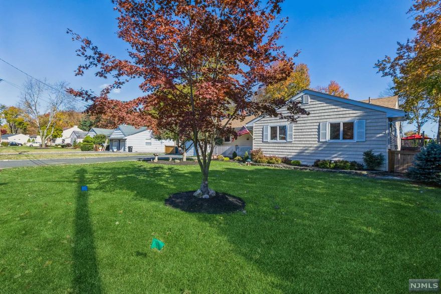 DO NOT MISS THIS IMPRESSIVE RANCH STYLE HOME LOCATED IN A SERENE AND PRIVATE SETTING! PRIDE OF OWNERSHIP IS SEEN THROUGHOUT THIS 4 BDRM. , 3 FULL BATH SINGLE FLOOR LIVING PROPERTY. Home features an inviting foyer leading to a bright and sun filled Living Room, Formal D/R with marble tile floors. Large Updated Eat-In Kitchen offers ample custom cabinetry with Granite countertops, double ovens, and S/S appliances. Double glass French doors off D/R lead to a large Family Room/In-Law Suite with updated full bath and bedroom with glass sliders leading to a private deck. Generous sized BDRMS. H/W and marble tile flooring throughout and updated baths. Master suite features a large wardrobe closet, updated bath with stall shower, and walk out to private deck overseeing an expansive oasis yard! Freshly painted, New Roof and New Central A/C system and much more!