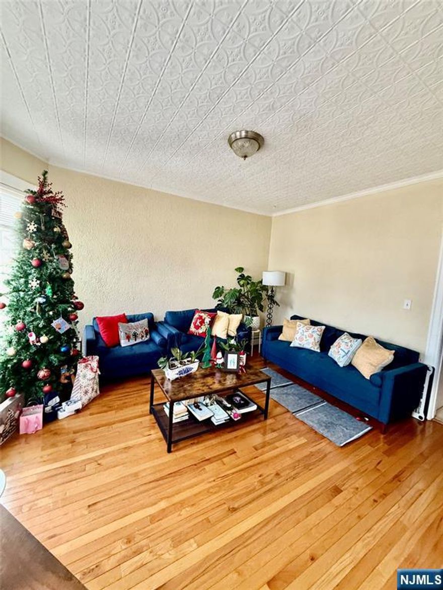 Unique second floor apartment, It offers three bedrooms each with a nice size closet, living room, eat-in-kitchen, stainless steal appliances with a full bath plus an in unit laundry. A huge bonus is the third floor great room. Landlord requires a credit check, interview, references, and tenant insurance. Utilities are the responsibility of the tenant. Landlord handles the lawn maintenance and snow removal. No pets or smoking. Move In ready and minutes from town, park and short ride to NJ Transit train station.