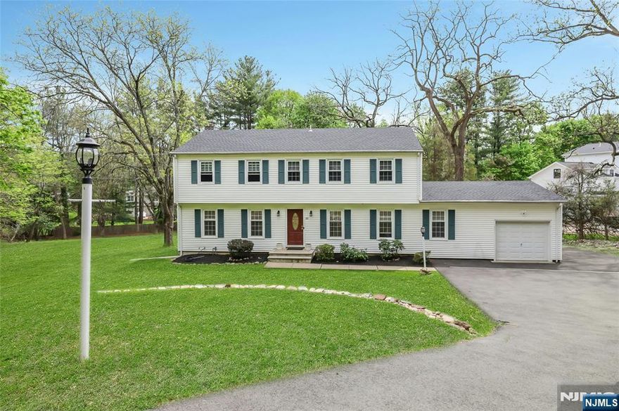 Welcome to this absolutely stunning, move-in-ready Colonial, thoughtfully renovated to combine timeless charm with modern comfort. This spacious 4-bedroom, 2.5-bath home sits on an oversized lot, featuring a huge, flat backyardâ€”perfect for outdoor living and endless possibilities. Designed with both everyday living and entertaining in mind, the home boasts a large Trex deck ideal for gatherings. Inside, youâ€™ll find generously sized, updated bedrooms, beautifully renovated bathrooms, gleaming hardwood floors, and stylish quartz countertops that elevate the entire space. Additional highlights include a 3-year-old roof and a full, expansive basement with plumbing already in place for an additional bathroomâ€”offering incredible potential for future expansion. Situated in the highly sought-after community of Woodcliff Lake, this home offers an unbeatable location just moments from local shops, the town pool, and top-rated schools. This is truly a home you donâ€™t want to miss!