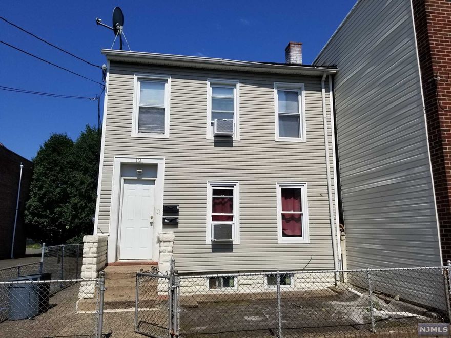 A fine locations for any investor, do not miss this chance! Two-family house in a quiet area of Paterson. Both units provide ample closet space, modernized kitchen, bathroom, and an inviting living room built with a smart floor design. A full basement with laundry that can be renovated into the owners wishes. A decently sized fenced in backyard with patio in the rear to entertain any guests. Close to shopping, dining, schools, and easily accessible from major highways!