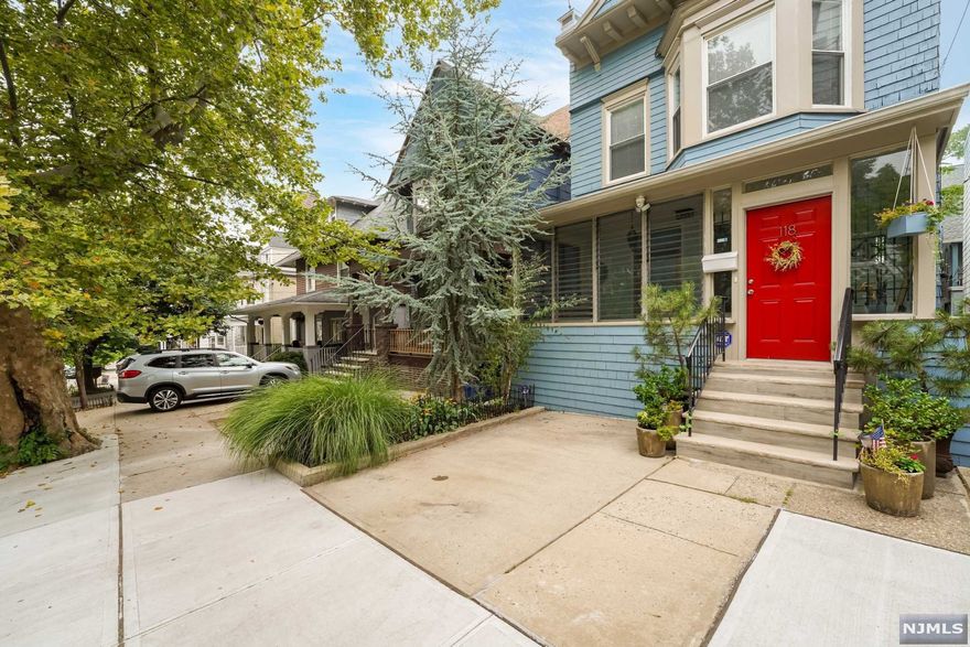 Modernized and well-maintained one family home, this home has modern upgrades and improvements while keeping original details such as pristine parquet hardwood floors with intricate inlays, beautifully restored stained glass windows throughout, original wood moldings and cedar shingles. Walk into a fully enclosed all seasons porch where you are welcomed by a gorgeous, light filled living room, separate sitting room, a modern kitchen fully equipped with stainless steel appliances and plenty of storage, lastly a dining room and a 1/2 bath, easy access to the yard from this floor make it perfect for entertaining. Make your way upstairs to the second floor, which boasts 2 expansive bedrooms that are bright and airy with an additional 3rd room which is currently used as a dressing room and 1 full bath. The spacious full walk out basement washer/dryer and a 1/2 bath. This home sits on a 25 x 80.24 ft lot, features private parking and a serene yard. Come see this Historic beauty.