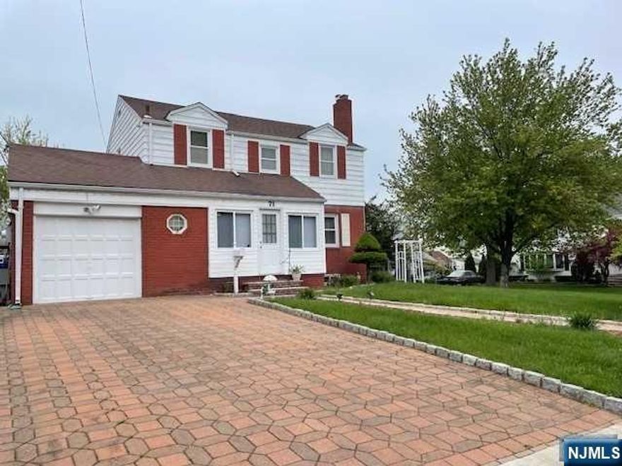 Beautiful and well maintained Center Hall colonial corner lot house, located in a nice residential neighborhood. Sunny enclosed porch with ceramic tile floors. New entry door. Hardwood floors throughout. Coat closet. It features nice size LR/wood burning FPL, Powder Room, Formal Dining Room. L-shaped EIK w/ granite counter peninsula dividing the kitchen. Door to the backyard patio with interlocking blocks. 2nd floor features Master BDRM, 2 BRMS, FBTH/Jacuzzi, Linen closet, Walk up Attic and Laundry Shoot. Full Finished Basement with ceramic tiles. Family room with decorative bar, FBTH, Laundry, Utility Rooms.1 Car attached garage. Long 4 car driveway and fenced in yard. Close proximity to highways and buses to NYC, Parks, Schools, Shopping.