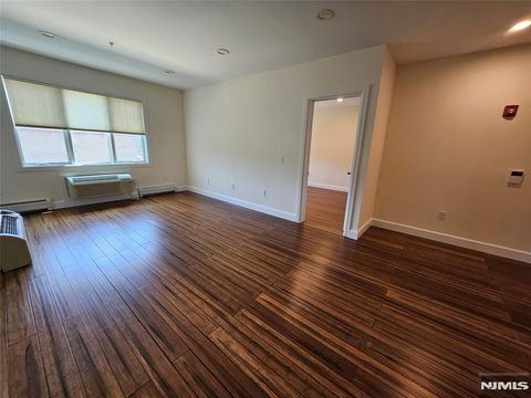 Photo of 125 W Central #306, Palisades Park, NJ 07650 (MLS # 25022608)