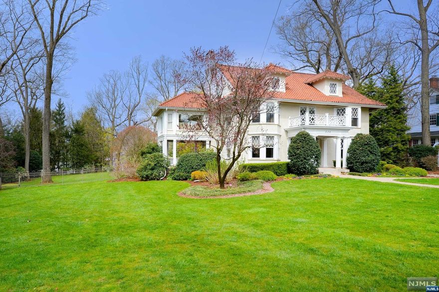 Nestled in the heart of the Heights neighborhood, this stately home exudes timeless sophistication. On nearly an acre, its proximity to the train & downtown adds to its allure. The foyer with a majestic staircase, is complemented by chestnut moldings and pocket doors. The main floor includes the LR, DR & Library w/fp leading to a covered porch. The kitchen, equipped with high-end appliances, caters to culinary enthusiasts. A highlight of the 1st floor is the Great Room, w/fp and doors opening to a patio with views of the yard. A mudroom with cubbies adds to the home's practicality. On the 2nd level, 4 bedrooms offer ample accommodation, while a bonus room providing views of the property. The Primary Suite with 2 closets and a luxurious bathroom, 3 more bedrooms and an updated full bath complete this level. The 3rd floor has 2 additional bedrooms, a custom closet, and a full bathroom. The LL features a 2nd family room/gym, laundry, & storage. The yard w/pool is exquisite.