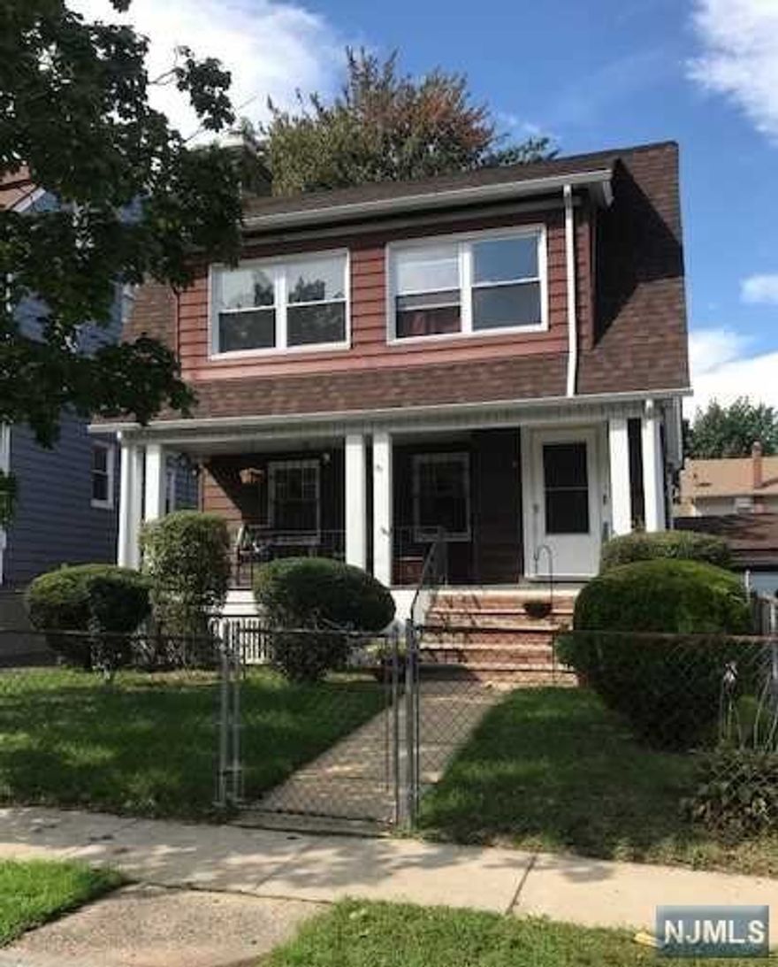 Charming 2-Family! 2 bedrooms, 1 bath, & fireplace each apartment. Spacious living room and separate dining room. High ceilings. A sun-drenched porch on the 2nd level. Full basement with 1 bath and 4 divided storage units, 2-car detached garage, and a quaint grassy backyard for your total enjoyment. Separate PSEG meters, 2 furnaces, 2 hot water heaters. Property sold AS-IS. Inspections for buyer's knowledge. The home has been well maintained. 1st time listed in 33 years.