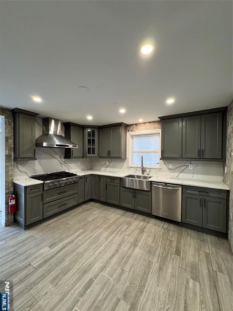 Photo of 191 Everett Pl #1, East Rutherford, NJ 07073 (MLS # 25043523)
