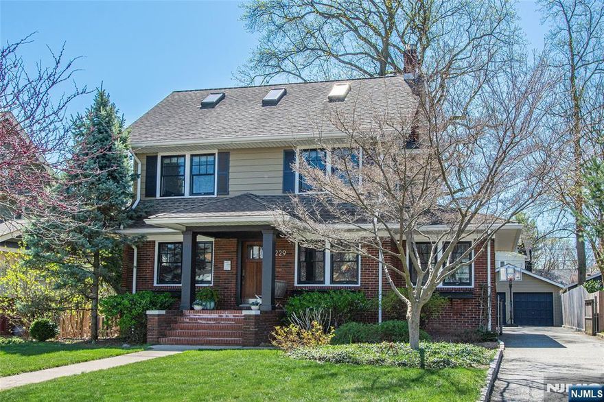 Located across from beautiful Brookdale Park and minutes from Watchung Plaza, this stunning 1920s CH Colonial perfectly blends timeless aesthetic with modern updates. A welcoming covered portico leads to a light-filled interior. The first floor features a large living room with a traditional fireplace & a sun-drenched sunroom featuring custom vaulted ceilings and built-in bookshelves. The dining room is accented by handprinted wallpaper and original leaded-pane windows. Modern wood and clad windows throughout ensure insulation, while picture rail moldings evoke charming period detail. The renovated kitchen offers stainless steel appliances, honed granite countertops, and custom maple cabinets, leading to a functional mudroom with built-in cubbies and slate flooring. The home offers oversized bedrooms with generous closets. The third-floor primary suite serves as a serene retreat with skylights, clever storage, and a modern European-style ensuite. A large open basement provides excellent storage and potential for a gym/rec/media room, alongside a spacious laundry room. Outside, a full-width bluestone patio overlooks a lush, landscaped backyard & a 2-car garage. The location is unbeatableâ€”near Watchung Plaza, Upper Montclair Village & Bloomfieldâ€™s Brookdale shops. Enjoy 121-acre Brookdale Park or quick access to NYC via the Midtown Direct train, Boxcar bus, or via Route 3 & Garden State Pkwy. This move-in-ready property is the complete package for your best Montclair life.