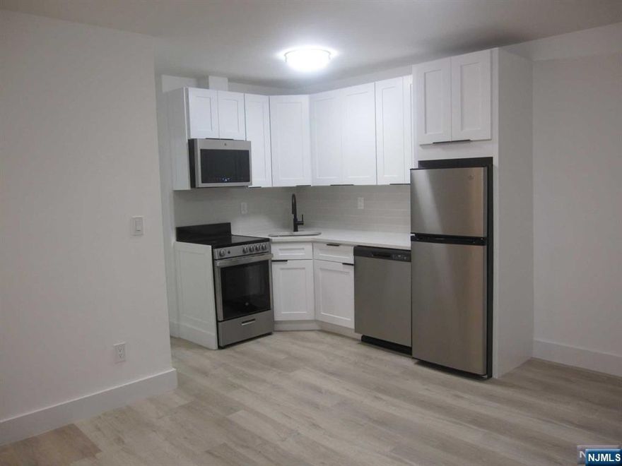 NEW, TOTALLY RENOVATED 1 BEDROOM APARTMENT, NEW KITCHEN WITH STAINLESS STEEL APPLIANCES, NEW WINDOWS, NEW FLOORS, NEW BATHROOM, AC. READY TO MOVE IN. NEAR TRANSPORTATION, SCHOOL, HOSPITAL, PARKING AVAILABLE. LAUNDTY ROOM ON LOWER LEVEL.