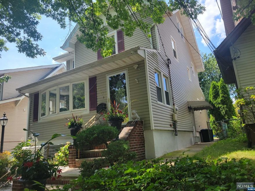 A nice size colonial in move in condition. This property features three good size bedrooms and two and a half baths. Property also has a finished basement and attic with a detached two car garage and plenty of parking space. Stove on first floor is electric.