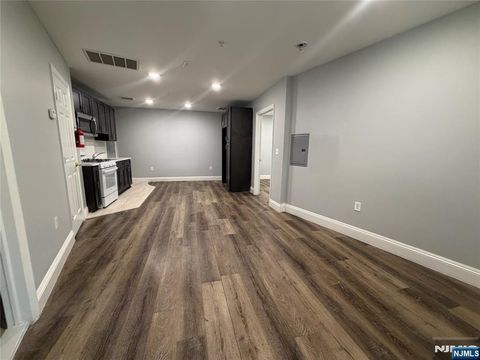 Photo of 231 Market St #401, Paterson, NJ 07505 (MLS # 26003023)