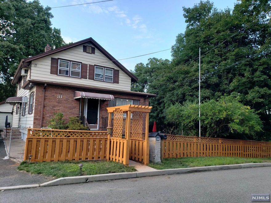 Don't miss this one. Rare 2 family on dead end street. First floor features entry with room for desk/cabinet, living/dining room combo ,2 bedrooms , full bathroom, Eat in designer Poppenghal kitchen with lots of cabinets, open staircase to sliding glass doors to covered patio area and the basement. The basement has laundry area, bathroom with stall shower, den/tv area, family room and office/den. 2 new gas boilers,new roof, all utilities except water. The yard is an entertainers dream with covered patio and open patio area room. There is a large shed and detached 1 + car garage with storage. Good for home based business or hobbies. Off street parking for 6 vehicles. Tenant has their own off street parking area for 2 vehicles. View of Oldham Pond from side yard. Property set high above the pond. Not a flood zone. Yard has room for a pool.