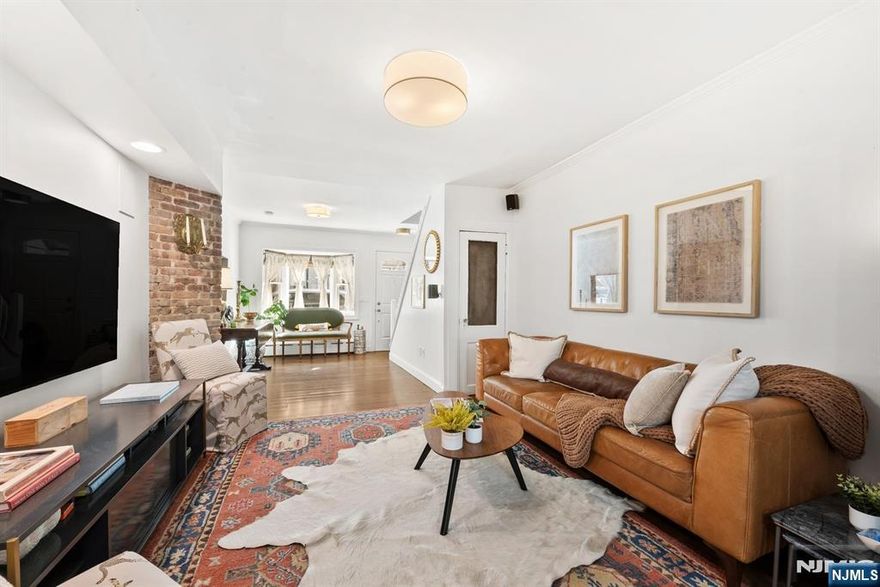 Welcome to this beautifully renovated, enchanting single-family home, perfectly situated on a quiet, historic cobblestone street in Hobokenâ€™s coveted Willow Terrace neighborhood. Blending timeless character with modern luxury, this 3-bedroom + office, 2.5-bath residence offers an exceptional layout for both everyday living and entertaining. The main level features a bright, open-concept living room and dining room, and is anchored by a chefâ€™s kitchen with sleek quartz countertops, custom cabinetry, and premium GE Café appliances. Rich oak flooring, exposed brick accents, and thoughtful design details create warmth and sophistication throughout. Upstairs, two spacious bedrooms and a dedicated home office provide flexibility for todayâ€™s lifestyle, while the top-floor primary suite serves as a private retreat, complete with a custom walk-through closet and a spa-inspired en-suite bath. A well-designed basement offers excellent storage, and central air ensures year-round comfort. Resident-only parking on this semi-private street adds a rare level of convenience. Located in the heart of midtown Hoboken, just moments from NJ Transit, PATH, Light Rail, and Ferry service, this home offers seamless access to Manhattan alongside close proximity to Hobokenâ€™s top restaurants, boutiques, parks, and waterfront. A rare opportunity to own a turnkey single-family home on one of Hobokenâ€™s most charming and sought-after blocks.