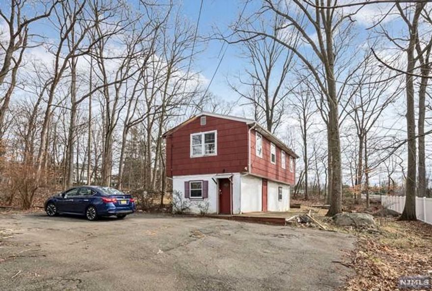 Lot 198R is positioned directly behind the main residence. This approximately .30-acre lot hosts a 1,536 sq ft home, presenting a fantastic opportunity for a rental property or additional living space, enhancing the value and appeal of this exceptional property.***ONLY BEING SOLD IN CONJUNCTION WITH MAIN RESIDENCE AT 198 RATZER RD.***