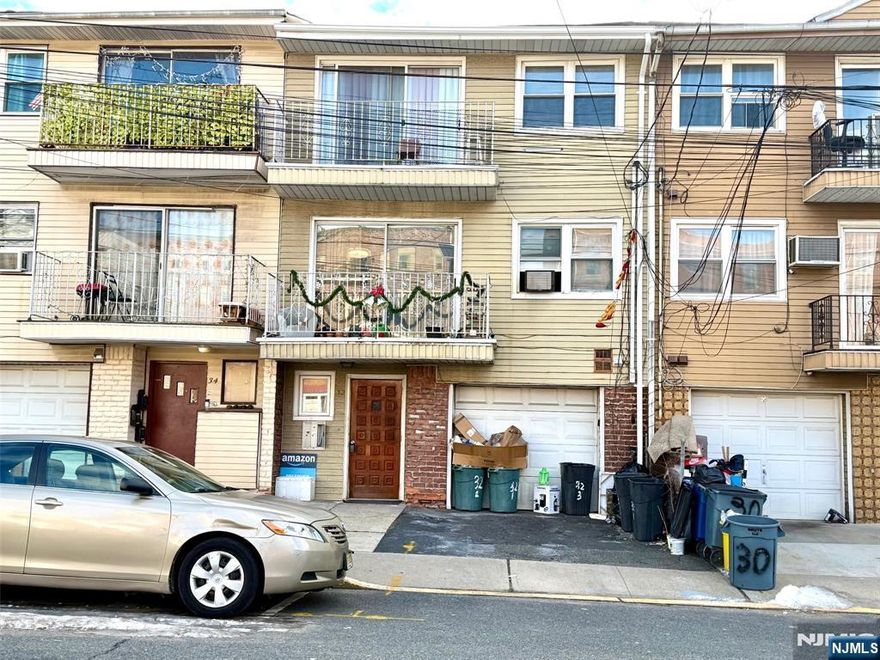 Newly updated top-floor apartment with 2 good-sized bedrooms in a 3-family row-house. Bathroom renovated 3 years ago. Entire apartment freshly painted. Brand new Vinyl plank floors throughout. Available to occupy by 1/2/26. Maximum occupancy: 4. Gas range, range hood, microwave & brand new Refrigerator provided. One gas heating boiler and hot water heater for the whole house. Tenant is responsible for 1/3 of the heating & hot water bills. Tenant to pay own cooking gas, and electricity. 1.5 months security deposit. No pets, no loud music and no smoking in or near the apartment. Coin-operated washer & dryer on ground floor. A parking space on the next block is available for rent $75 a month. Application, tenant credit & eviction check ($40 per working adult), and proof of ability to pay rent required. Short walk to Harrison Path Station, shopping, schools & buses. Convenient to NJIT, Rutgers, NJPAC, Prudential Center, parks, Turnpike, Parkway, Rt. 280 & Rt. 21.