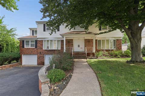 Photo of 585 Churchill Road, Teaneck, NJ 07666 (MLS # 26031893)