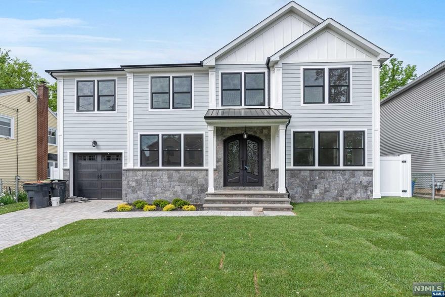 Stunning 7-bedroom 4.5 bath new construction home located in most desirable neighborhood. The first floor features a 2-story entry way, living room, formal dining room with coffered ceilings, family room leading seamlessly into a large modern eat-in-kitchen, complete with high end double appliances, quartz countertops and an over-sized island. The walk-in pantry, mud room off the garage and powder room completes the first floor. The second level features a Master Bedroom suite with trey ceilings, custom walk-in closet and spa-like master bath. 4 additional bedrooms, 2 full Jack and Jill baths, and laundry complete the second floor. The lower level has a large recreation area, 2 spacious bedrooms, a full bathroom, utility room. The home features 9ft ceilings on the 1st level and 8ft ceiling and radiant heat throughout the basement, 3 zone heat, 2 zone ac, a whole house generator, inground sprinklers and much more. Close to multiple houses of worship, parks and transportation.