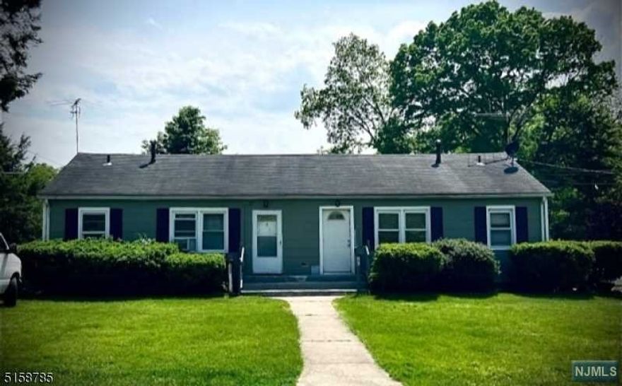 Contractors dream! 2 family with attached office space that has separate entrance and attached to unit 140 lot has the possibility to be sub divided, buyers do your diligence.