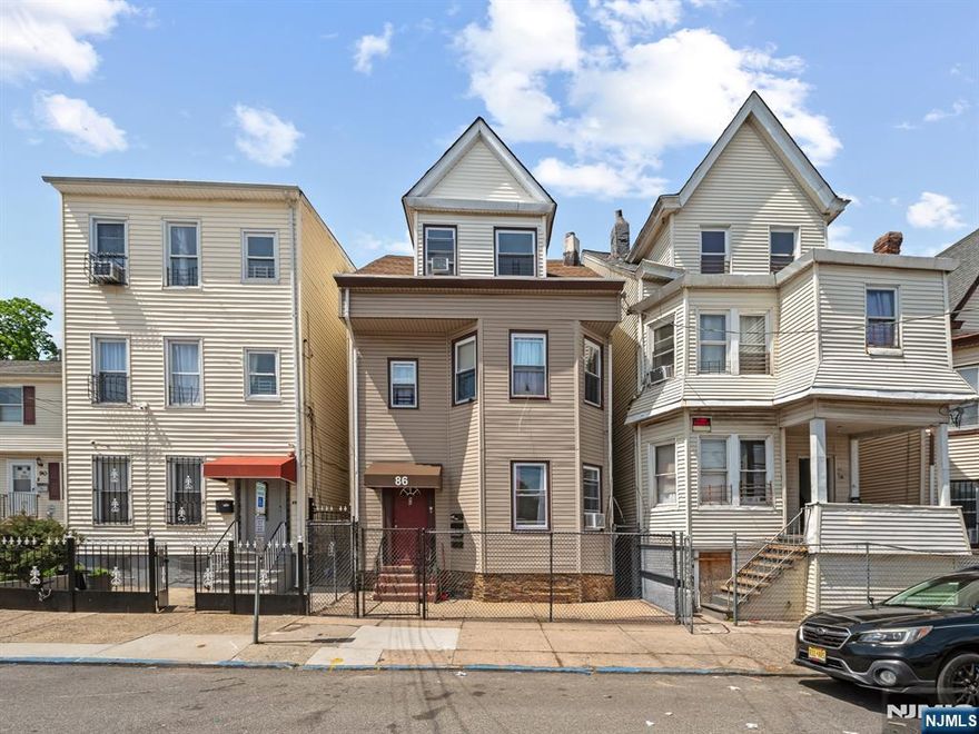 Well-maintained 3-family property offering strong income potential in a convenient Paterson location. Each unit features 4 bedrooms and 1 full bath, providing spacious layouts ideal for a variety of living arrangements. All units are currently occupied, generating consistent rental income. The property includes separate living spaces with baseboard gas heating, window unit cooling, and a full walk-out basement offering additional utility and storage. Situated on a regular 25x100 lot, the home is constructed with vinyl siding and is connected to municipal water and sewer. Conveniently located near parks, schools, shopping, and public transportation, making it attractive for both tenants and investors. A solid opportunity to own a multi-family property with existing cash flow and long-term upside.