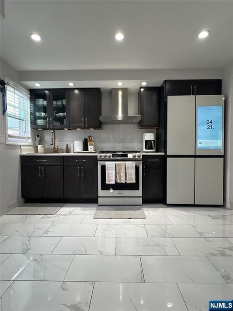 Photo of 493 River Dr, Elmwood Park, NJ 07407 (MLS # 26007566)