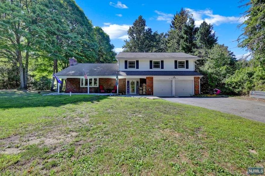 Welcome Home! Come See This Lovely Split Level Home Located in Lower West Milford! This 5 Bedroom, 2.5 Bath Features Include, Entry Foyer with Large Closet, Spacious Open Kitchen with Split Level to Den/Family Room Sitting Area, A Formal Dining Room That Flows into the Living Room with Brick Fireplace and Wood Burning Stove Insert! Great Size Bedrooms and Bathrooms! Den and Kitchen Have Walkout Access to Backyard Patio Perfect for Entertaining! Enjoy the Beautiful Park Like Private Back Yard! Just 1 Hour To NYC This Home is Located Close To Schools, Shopping, Dining, Highway Access & More!