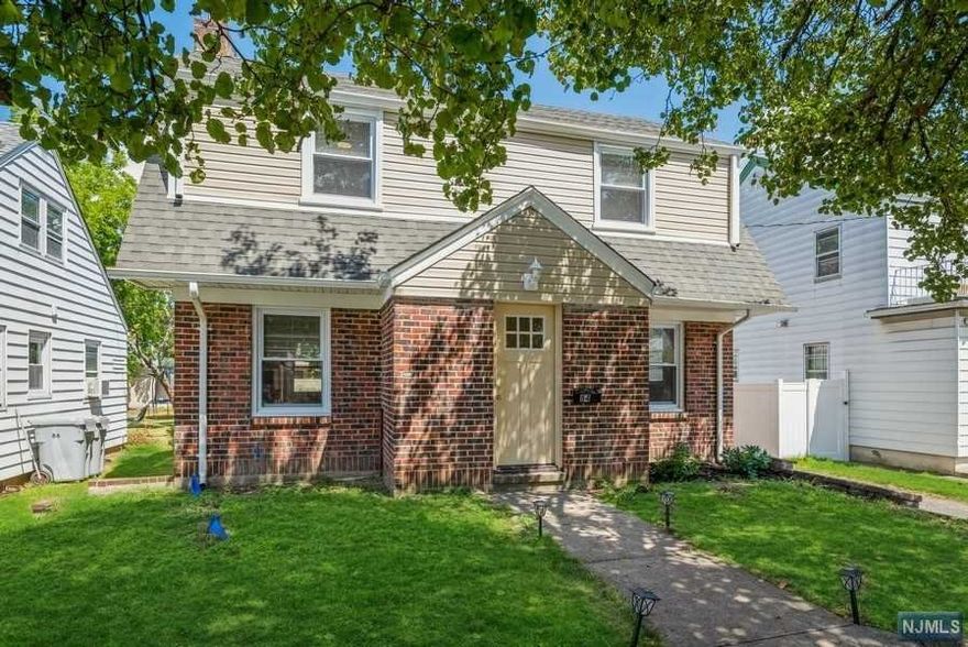 Beautifully remolded 2-story colonial bordering Totowa, walkable to Westside Park. Almosteverything is BRAND-NEW, including Windows, roof & siding on home and garage, externaldoors, baseboard heat, gas furnace, hot water heater & Kitchen complete W/stainless steelappliances & garnet counter tops. Stunning refinished Hardwood floors on both levelsEnjoy cozy winter nights in front of wood-burning fireplace & summer days in the sunroomlooking over a decent-sized yard - Do I hear Pool? - . Basement is partially finished, with washer/dyer hookups, slop sink, utilities. 3 bedrooms and full main bath on the second level. This home is move-in ready, conveniently located, and waiting to be enjoyed!