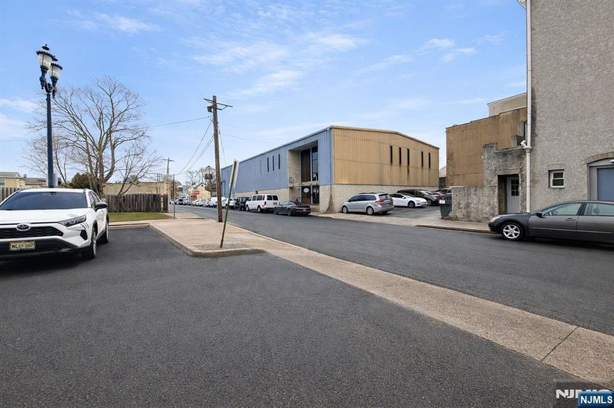 This Somerset County facility is a turnkey solution for large-scale bakery production or food manufacturing. Spanning a generous 16,740 sq. ft. lot, the property is strategically located with immediate access to Route 22, providing seamless logistics to Routes 78 and 287. Impressive 25-ft clear ceilings and a dedicated drive-in loading dock. Fully equipped with an industrial walk-in freezer and refrigerator. Includes professional-grade industrial ovens and a suite of baking equipment. Large receiving room and 10 dedicated parking spaces located directly across from the property. A full second level featuring 7 private offices, 2 conference rooms, a coffee break room, and 2 restrooms. An on-site display and storefront area, perfect for direct-to-consumer sales or a flagship showroom. In addition, there are 2 Vaults Onsite, 1 is 10.5ftx12.5ft and the other 18ftx12.5ft. Whether you're looking to expand an existing food brand or launch a centralized distribution hub, this versatile property offers the infrastructure to scale immediately.