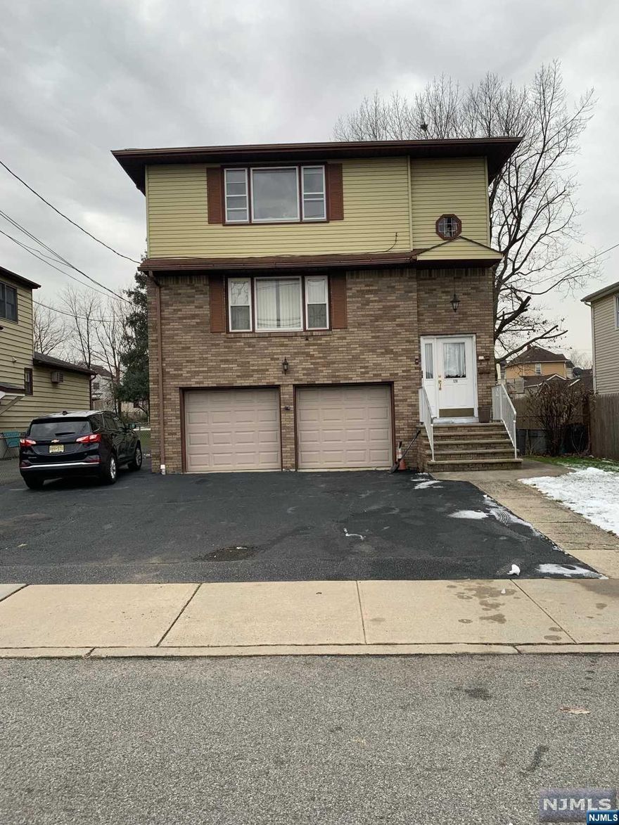 WELCOME TO THIS TWO FAMILY HOME IN THE HEART OF LODI WITH ON A DOUBLE LOT! THE FIRST FLOOR UNIT HAS A KITCHEN, DINING ROOM, LIVING ROOM, 3 BEDROOMS ONE BEING A PRIMARY BEDROOM WITH ITS OWN EN SUITE BATHROOM, AND ANOTHER HALLWAY BATHROOM! THE SECOND FLOOR UNIT IS THE SAME EXACT SET UP AS THE FIRST FLOOR UNIT. THEN THERE IS THE GROUND LEVEL WITH ACCESS TO THE TWO CAR GARAGE, LAUDNRY, SEPERATE UTILITES, A FULL BATHROOM, LIVING ROOM, BEDROOM, KITCHENETTE. PLENTY OF PARKING IN THE DRIVEWAY TWO FOR 4-6 CARS OUTSIDE OF THE GARAGE.SEPERATE UTILTIES, 2 BOILERS, 2 ELECTRIC PANELS, 2 HOT WATER HEATERS! AS IS SALE ALL APPLIANCES AS IS. COME CHECK OUT THIS BIG MULTI FAMILY HOME ON OVER APPROX 10K SQ FT. LOT!