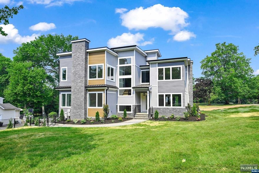 Nothing short of spectacular! This 5BD 6.5BA 6000+ sf Custom CONTEMPORARY NEW CONSTRUCTION home w BUILT-IN POOL set on a quiet street in the prestigious Riker Hill neighborhood. Features 3 car garage, floating staircases, multi Fps, covered patio overlooking backyard oasis, 9'-10' ceilings, custom closets throughout & lg windows. Expansive kitchen open to FR w FP & sliders to covered paver patio. Kitchen includes Sub-Zero & Wolf appliances, designer kitchen cabinets, lg center island w waterfall top, quartz countertop, lg pantry & 1st floor en-suite w elec FP. The 2nd floor is home to 4BDs w a palatial Primary Suite w a balcony overlooking backyard, huge sitting room w elec FP, enormous walk-in closet and spa-like bath w soaking tub, stall shower & dual sinks, all other 3BDs are all en-suites; Laundry. Finished Basement w 9' ft ceilings is equipped w a Bed/Office, Large Rec Room w a built-in bar & Full Bath. 10 YR BUILDER WARRANTY. Photos are samples for illustration purposes only