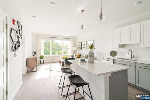 Photo of 15 W Johnson Ave #410, Bergenfield, NJ 07621 (MLS # 25036462)