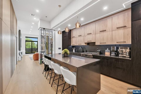 Photo of 518536 Gregory Avenue #A101, Weehawken, NJ 07086 (MLS # 26025304)