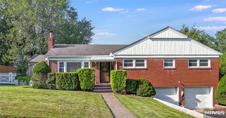 Welcome to this beautifully maintained, all-brick, maintenance-free ranch in sought-after Oradell! This 3-bedroom home features an open-concept living room with a fireplace, hardwood floors throughout, dining room, and an updated, stunning eat-in kitchen. The primary bedroom includes a full bath, two additional bedrooms, and an updated full hall bath. Enjoy the enclosed all-season room currently used as an office with direct access to a large deck and private yard, perfect for outdoor entertaining. The partially finished basement offers a family room, laundry, and utility room, with direct access to the oversized attached 2-car garage with automatic openers. Additional features include a double-wide driveway, central air, and sprinkler system. Conveniently located near NYC/NJ transit, parks, and shopping. Oradell has been ranked #1 in â€œBest Towns to Live in NJâ€, come see why!