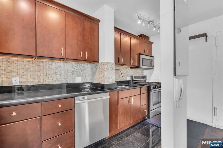 Enjoy modern comfort and convenience in this Fort Lee studio co-op, with access to express bus service offering an estimated 35-minute commute to Port Authority in Manhattan. Positioned near the GW Bridge and major highways, itâ€™s also close to shopping, dining, parks, and nature trails. The renovated interior features a 5-burner Whirlpool gas range with convection oven, Bisazza glass tile bathroom, hardwood floors, and a custom Elfa closet, reportedly more spacious than many comparable units. Laundry is located on the floor above. Low monthly maintenance and close proximity to Linwood Plaza, H-Mart, Starbucks, CVS, and more add to the homeâ€™s overall appeal.