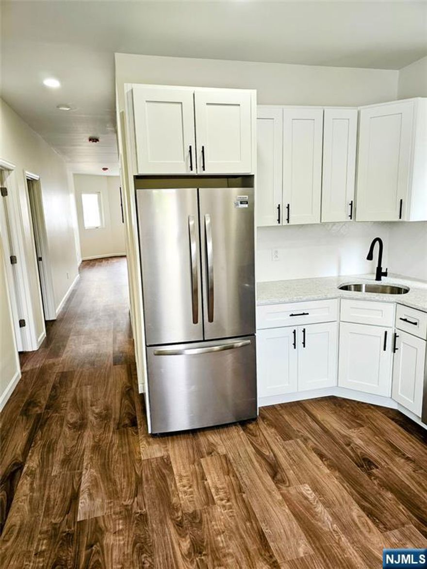 Brand New Totally ,Renovated ,new construction 2 Bedrooms Plus Large 2nd floor Unit as You Enter, Large Living room, Den Combo, 2 Bedrooms and Another room as could be used Guest room, Work Computer room, Full Bath, Kitchen with New Cabinets, Granite Tops with Stainless Steel Appliances, Washer/dryer room, Central Air and Use Of Backyard. 20 Mins To Holland Tunnel to Manhattan, Newark Airport and Rutgers University composes. The Owner holds R.E. License.