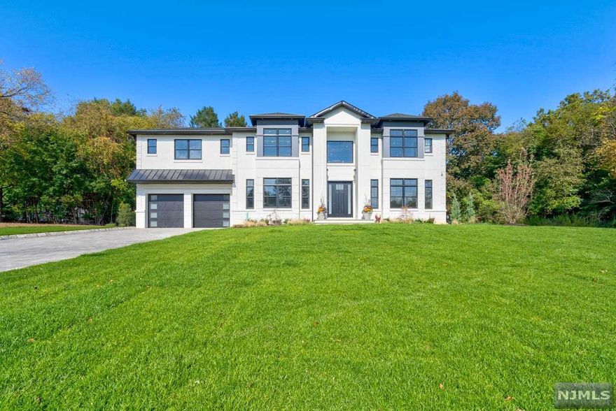 Tenafly's newest community. Similar home to be built! ANNOUNCING the builder is now offering complimentary to the buyer the opportunity to semi custom design their own home by meeting with the architect and interior designer. The Knickerbocker Estates -2 out of 10 completed, 1 already SOLD situated on a 1/2 of flat property on a brand-new cul-de-sac This to be built home approx 4,500-4,800 sq ft +/- sq ft of luxury living space plus a finished lower level. A rare opportunity to live in Tenafly. Fall 2020 Completion. Sleek & modern w/exquisite finishes, open floor plan w/stunning gour kit & attached fr/fpl making this space perfect for everyday living and entertaining. A luxurious master suite & spa like master bath w/steam shower & radiant floors, 3 add'tl bd and 3 full bths complete the 2nd floor. This residence is convenient to Tenafly's award winning schools and convenient to NYC trans.