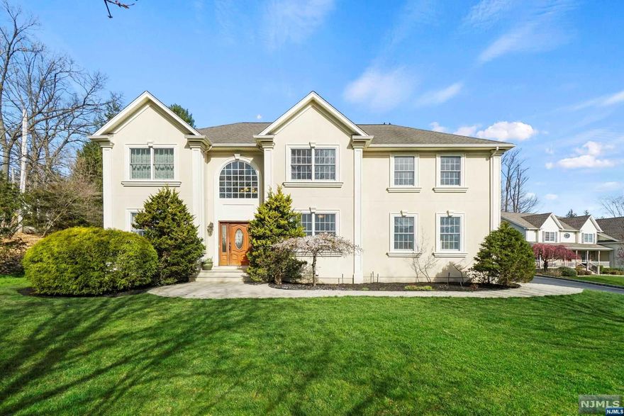 Welcome to 10 Keller Court in Park Ridge! This spacious Colonial home, built in 2005, offers over 3,100 square feet of living space on nearly a half-acre lot. Situated on a quiet cul-de-sac, this property boasts 4 bedrooms and 3 full bathrooms. The main floor features a grand 2-story entry foyer, formal living and dining rooms, an eat-in kitchen, vaulted ceiling great room with a gas fireplace, home office, full bath, and laundry room. Upstairs, you'll find a primary bedroom suite with a walk-in closet, along with 3 additional bedrooms and a full hall bath. The full unfinished basement provides ample storage or potential for customization. Outside, mature private landscaping enhances the property's appeal. Conveniently located in the heart of Park Ridge, residents enjoy easy access to public transportation, shopping, restaurants, parks, and schools. Truly a MUST SEE!