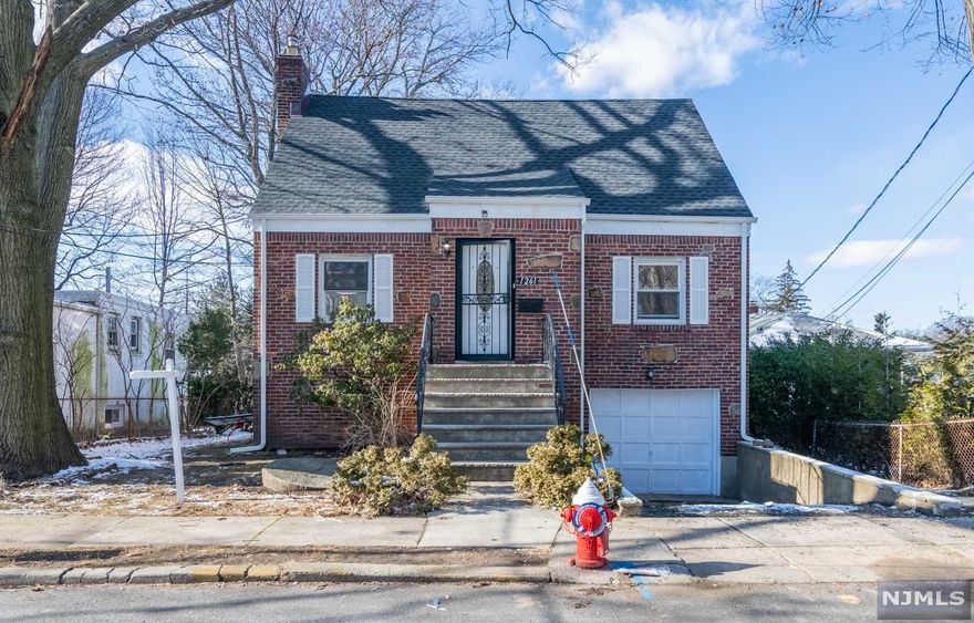 Cozy house located at the most prestigious neighborhood of Fort Lee. very Bright! Wood floor through out. Special Wood fireplace in living room, Eat-in kitchen with white cabinets and quartz counter top. There is a bedroom and full bathroom at First. Second floor feature 2 large bedroom, large closets, Full bath. Ground lower level with recreation room, full bath, Glass door to back yard. A lot of update including New installed heating boiler and hot water boiler, new paint, new garage opener system, New driveway. NYC Transportation outdoor, mins to school, shopping, restaurants, major interstate highways.