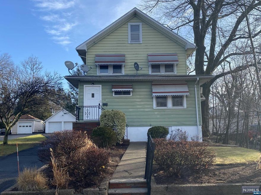 Location, Location, Location! Freshly painted, new flooring, carpets cleaned, Right across from the train, near shopping and transportation. First Floor unit has screened back porch leading into an eat-in kitchen. Large living room, 2 BRs plus a bonus room of equal size. Full bath w/shower over tub. Carpets cleaned and unit freshly painted. Peerless gasfired boiler and newer Hot water heater. 2nd Floor offers separate entrance from front, a living room and kitchen with access to a rear balcony, 2 BRs and a full bath, new LVP flooring and freshly painted, separate HVAC and newer hot water heater. Both units have a separate laundry room in basement. Plenty of parking in 2-car detached garage and asphalt driveway parking. 170 foot deep and private yard. Newer electrical service separate for each unit. Investment opportunity or owner occupied and rent out. As-is.