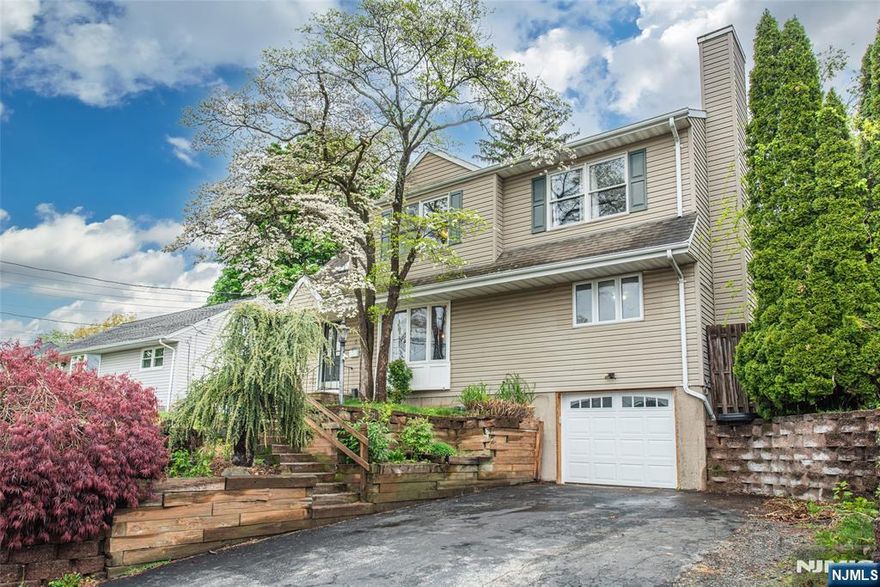 Tucked away on a quiet cul-de-sac in desirable Butler, this spacious Colonial offers versatile living across three fully utilized levels. Featuring 4 bedrooms and 3 full baths, the home includes a fully equipped lower-level living suite with its own kitchen and bathâ€”ideal for extended living or guest accommodations. The main level showcases an open, flowing layout with hardwood floors, an inviting eat-in kitchen with sliders to a private, fenced backyard framed by mature landscaping. A warm and welcoming bonus space with French doors, custom built-ins, and a wood-burning fireplace provides the perfect setting for a den, office, or recreation room. A first-floor bedroom and full bath add flexibility and convenience. Upstairs, the expansive primary suite impresses with cathedral ceilings and access to a beautifully updated Jack-and-Jill bath featuring a large walk-in shower and skylights that flood the space with natural light. Two additional well-proportioned bedrooms complete the second level. Additional highlights include central air, ceiling fans, central vacuum, and public utilities. Ideally located near schools, shopping, major highways, and transportation, this home offers the perfect blend of comfort, space, and convenience.