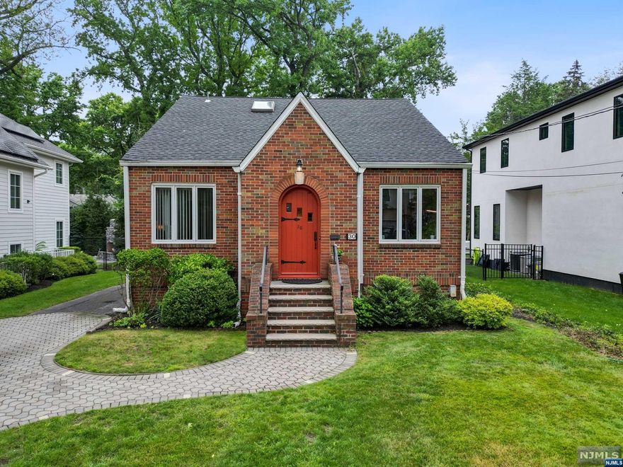Welcome to this immaculately maintained home in sought-after Tenafly. It is perfectly situated on a beautiful, quiet residential street close to everything and steps away from the NYC bus. This sundrenched three-level home is surprisingly bigger than it appears (2,016 sq. ft. per tax record). All updates were well thought out. As you enter you will be welcomed by old world charm blended with a modern appeal. The first floor offers 3 bedrooms, formal living room, dining room, kitchen, and a full bath/jacuzzi with cathedral ceiling and skylight. The second floor is dedicated to a full primary suite that boasts a cathedral ceiling and two skylights. It is complete with a walk-in closet and plenty of storage space. The full-footprint, full height, walkout basement has 5 windows and is tastefully finished. It includes a flex room, a huge family room, storage and laundry room. The private backyard is serenity at its finest, with an oversized deck, waiting for your outdoor gatherings.