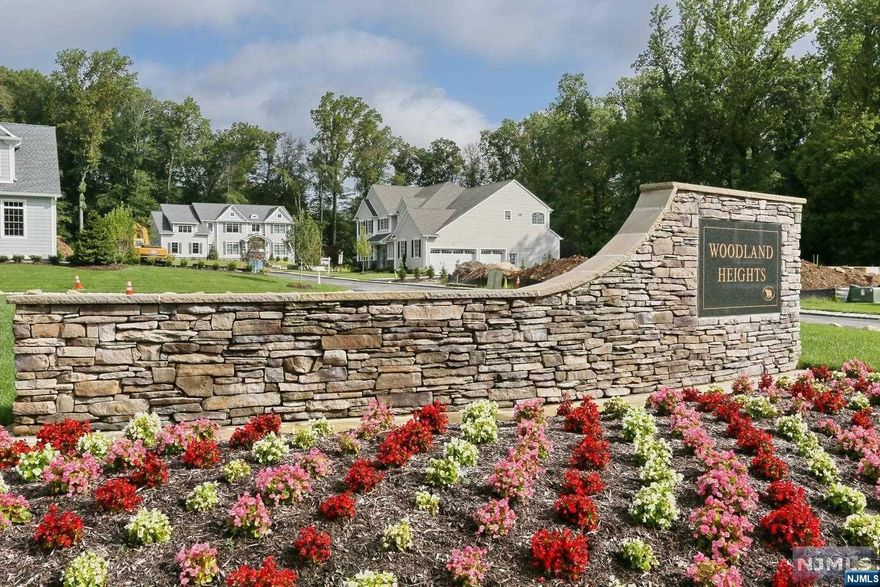 NEW CONSTRUCTION!! ONE OF 2 HOMES LEFT TO BUILD IN THE PRESTIGIOUS WOODLAND HEIGHTS DEVELOPMENT. TOTAL OF 20 NEW HOMES IN TOTAL. APPROX 4000 SQFT. OF TOP OF THE LINE CONSTRUCTION BY WELL KNOWN LOCAL BUILDER. FIRST FLOOR: 2-STORY ENTRY FOYER, FORMAL DINING RM, 2 STORY GREAT RM/FIREPLACE, OPEN FLOOR PLAN TO THE MODERN GOURMET EAT IN KITCHEN WITH A SEPARATE BREAKFAST AREA, POWDER RM, MUD RM WITH ENTRY FROM THE 3 CAR ATTACHED GARAGE, LIBRARY/STYDY, GUEST BR/FBTH/SS. 2ND.FLOOR: PRIMARY BR,SITTING RM,HIS&HER WI,CLOSETS,FBTH/TUB&SS,BR/FBTH/SS, BR/FBTH/SOT/BR,LAUNDRY RM. THE FULL BASEMENT IS UNFINISHED WITH UTILITIES, STORAGE. ESTIMATED COMPLETION AUG 2023. FULL SPECS AND FLOOR PLANS AVAIL .CLOSE TO SCHOOLS, SHOPPING AND PUBLIC TRANSPORTATION. HOA FEES ARE $550 PER MONTH FOR SNOW REMOVAL, LAWN CARE.