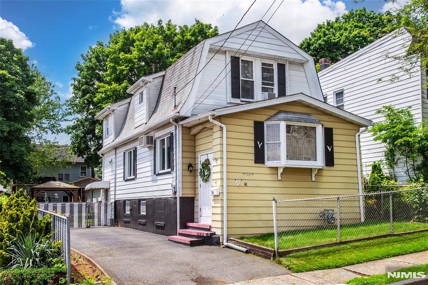 Pristine colonial nestled in sought after Albion section of Clifton.Known for its residential character & proximity to Albion Memorial Park,Garrett Mountain Reservation, & A+ #5 Grammar School.A stone's throw to NYC bus & major highways,,Center City Mall, & delicious local restaurants.Eat in galley kitchen features walk in pantry & plenty of cabinets.Adjacent L shaped living/dining area perfect for entertaining.Three good sized bedrooms upstairs & a full, unfinished basement with great possibilities.Updated hot water heater & electric.Loads of closet & storage space.Don't miss this gem of an opportunity!