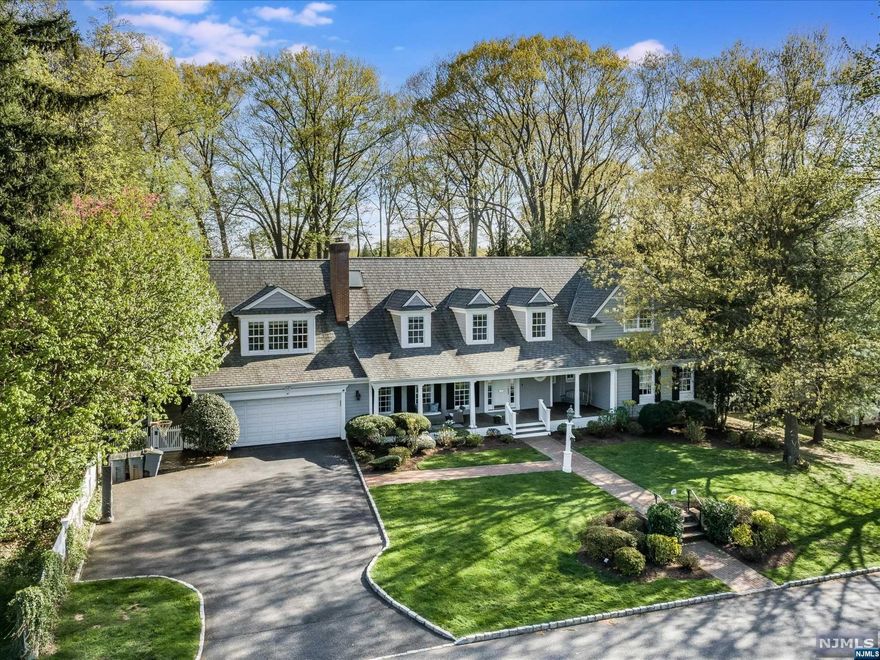 Everything you have dreamed of and more! Offered for the first time since construction and located in the beautiful Heller Drive neighborhood.From the welcoming front porch to the large backyard with deck and bluestone patio that will make you swoon. This one of a kind floor plan has both comfy, cozy spaces and an open feel.This lovingly curated home boasts a spacious, renovated kitchen/greatroom overlooking a magnificent park-like backyard. The 1st floor also offers a 2nd primary en-suite bedroom option,formal LR/DR, office,playroom,library & mudroom/laundry room.The expansive 2nd floor includes a primary suite and spa-like bath with two custom walk-in custom closets, 4 addtl BR'ss, 3 full baths + 2nd floor hang-out space with built-in desks.The finished lower level has game room and large multi-purpose area ideal for movie nights. More dedicated storage space and a powder room.Brookdale, Yantacaw Brook and Tuers Park in very close proximity. You can have it all with this one!