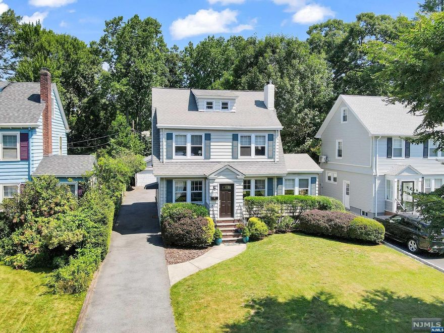 This light-filled, charming Upper Montclair 4 bedroom colonial will have you fall in love the moment you step inside. This home is in the ideal location, close to Brookdale Park & NYC transportation btwn Watchung Plaza & Upper Montclair Village. Large EIK with bow window w granite countertops. The main level also features a living room with a wood burning fireplace, an office, a dining room, the eat in kitchen, and a family room/den. Access to the large Trek deck overlooking the private park-like property and gorgeous backyard. Upstairs you will find 3 bedrooms and a bath, 3rd fl has a spacious 4th bedroom w tons of storage. Head downstairs to the finished basement w a half bath, laundry area & tons more storage. The driveway houses 5+ cars and the massive detached 3 car garage has so many possibilities...make it your own! This home is situated in the perfect part of town on a large 47x229 lot. Fireplace, chimney, flue, windows and garage being sold as is with no known issues.