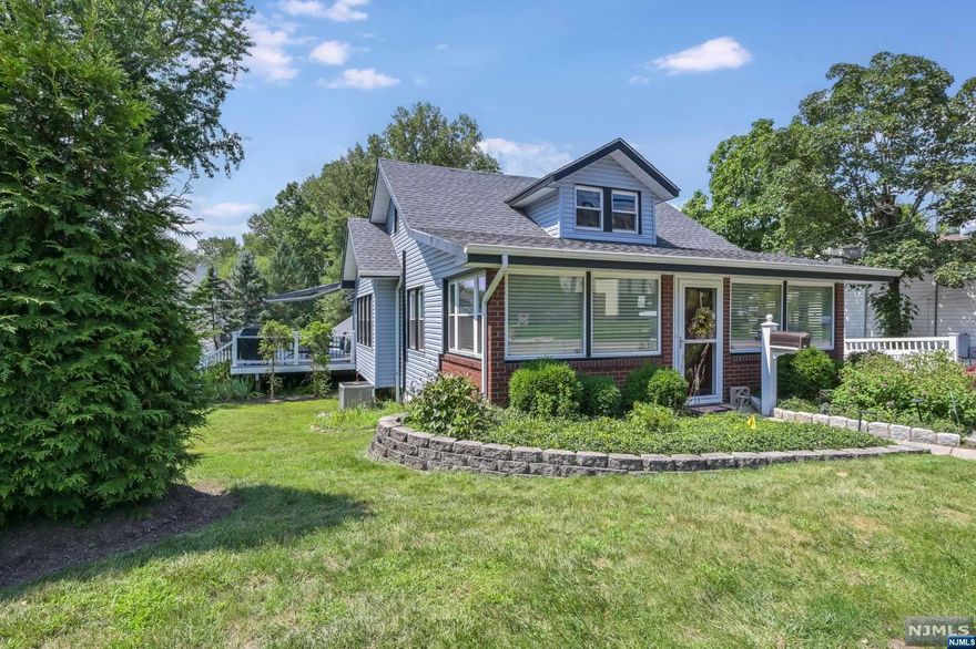 Welcome to this Closter gem! This recently remodeled home will wow you from the moment you walk in. It has a heated enclosed porch, a formal living room and dining room, a new full bathroom, and a bright, new kitchen with plenty of cabinetry, quartz countertops, and stainless steel appliances. The kitchen opens to the new trex deck with a retractable awning that overlooks the beautifully gardened and private property. Among the renovations are new flooring, windows, decking, siding, and roof. There is also a 2 car detached garage, central air and full basement with a separate entrance that offers untapped potential. A fantastic chance to purchase a beautifully remodeled and pristine home in Closter, which is ranked #5 among the best suburbs in New Jersey and has an A+ rating on Niche. Don't miss this exceptional, east facing home! Low taxes too!